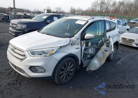 2018 Ford Escape Titanium z USA, uszkodzony, nr VIN 1FMCU9J99JUC64259